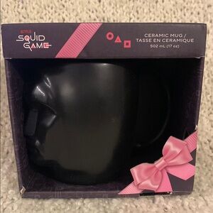 Squid Games  character mug, 17 ounce capacity.